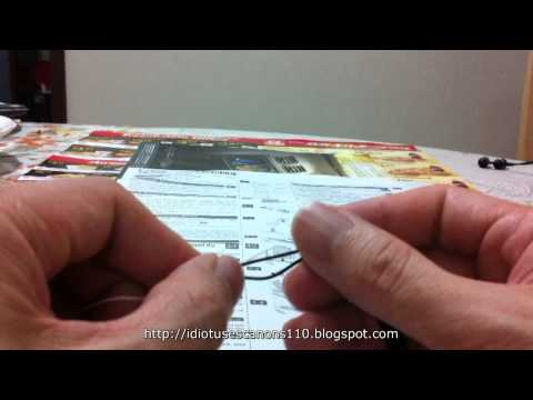 how to attach the strap on a canon camera