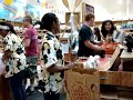 Shannon Bobbitt and Temeka Johnson Bagging Groceries