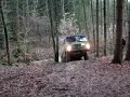 Volvo c306 driving up short muddy slope Volvo c306 driving up short muddy slope