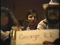 This is part 2 of 4 videos taken at 1988 WorldCon in New Orleans.In this video, you'll hear about how George recruited writers into the Wild Cards Consortium.Contributing authors on panel are: Bud Simons, George R.R. Martin, Melinda Snodgrass, John J. Miller, Ed Bryant, Gail Gerstner Miller, Vic Milan, Lewis Shiner, Walter John Williams, and Steve Leigh.A big thanks to Gilda Simons, who recorded the footage.