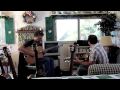 Adrien Moignard and Mathieu Chatelain choose their guitars for Djangofest Northwest 2009