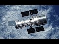 The famous Dr. J. stages an awards ceremony for the Hubble Space Telescope. He summarizes Hubble's major achievements and its central role in a revolution in our understanding of the universe.