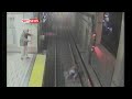 Drunken women falls in front of train
