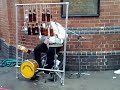 I finally got the vid up! Mwhaha! May I present: The Random Beer Bottle Guy near Paddy's Market... .... who is freakin awesome! *heart* (I think he said that the crazier he looked/acted the better he played rofl)