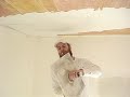 Plastering a ceiling
