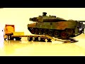 Tamiya Leopard 2A6 tank unloading from a Wedico Drop Deck Trailer
