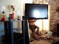 My husband removing base from tv part 3