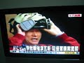 taiwan legislator, li ao, sprays tear gas in the legislature while sporting a v mask.
