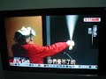 taiwan legislator, li ao, sprays tear gas in the legislature while sporting a v mask.