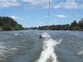 brother kneeboarding behing a malibu vtx