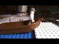 TEST - minifig climbing out of a rowboat
