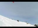 A Snowkiteboarding Warning Jump