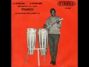 i don't have any pictures of isaac musekiwa speaking, so here is one of him playing alto sax (1989), which he has done from the early 1960's untill his death, within months after franco died. before that, in the 1950's, isaac played tenor sax with african jazz and o.k. jazz. here, isaac (zimbabwian) does the introduction in english. vocals, besides isaac and franco: youlou mabiala and lola ch�cain. franco would rework this tune in the late 1970's when he incorporated it into oh! miguel. miguel, like m'poto, stands for europe. foto isaac: johan vd krogt. als je dit ziet johan, neem alstjeblieft contact met me op. (jij kent me onder mijn echte naam) dus registreren & mailen. ajb.
