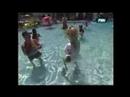 pammy fully clothed in the pool