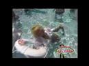 pammy fully clothed in the pool