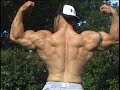 Bodybuilder Joe McRee outdoor posing Bodybuilder Joe McRee outdoor posing