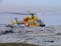 this is video footage of the southern region westpac lifesaver helicopter at work in sydney and surrounding mountains