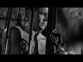 muscular hunk james west (robert conrad) gets captured, chained, and caged by a crazed blind admiral, all the while showing off his muscled hairy chest and abs.