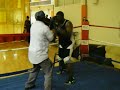 2009 USA Amateur Middleweight Champion Terrell Gausha hits pads with Coach Renard Safo