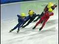 Speed Skaters Jeff Simon and Zhang Zhiqiang go down Speed Skaters Jeff Simon and Zhang Zhiqiang go down