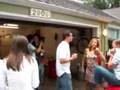 Paul gets beer pourd on him.