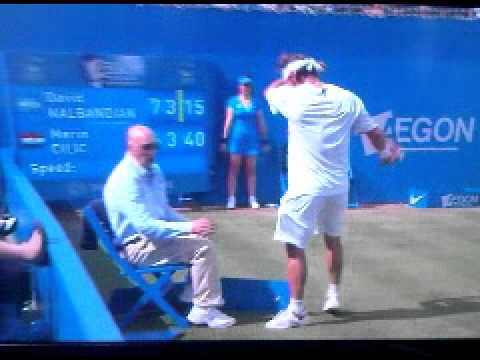 david nalbandian disqualified - David Nalbandian disqualified from Queen's final after kicking advertising board & cutting linesman's leg. Cilic wins.