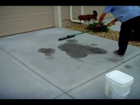 how to remove oil stains from a driveway