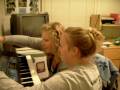 Alicia and Bobbi try to learn the piano Alicia and Bobbi try to learn the piano