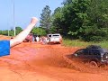 Lifted Trailblazer going through mud hole