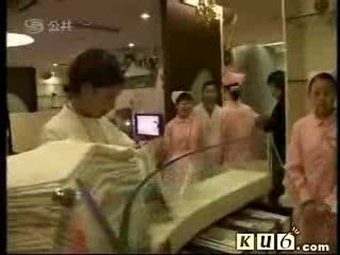 newhalf - 30-year-old Li Guohua chinese transsexual who underwent sex change operation, get a job as nurse. She look happy once she removed wrong male sexual organ and...