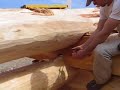 Log home building, scribing, saddle-notch