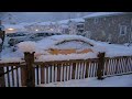 snow falling at night by my house and covering my new bug