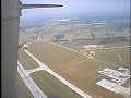 world war ii reenactors jumping from a wwii-vintage c-47 in authentic uniforms.