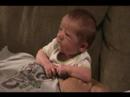 Caden holding head up with dad!