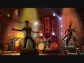 Guitar hero world tour vs rock band 2
