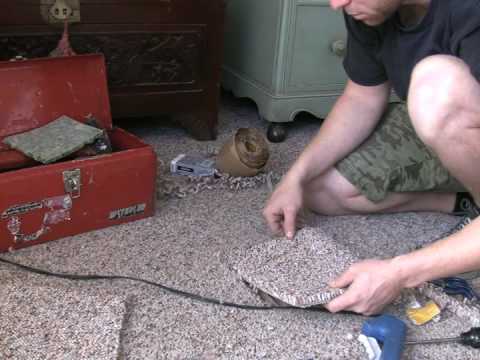 how to repair ripped carpet