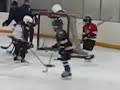 Little kid learning ice hockey 2