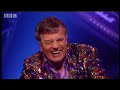 Mark Lamarr is forced to sit cross-legged on his desk to get a full view of the rock icon that is Slash singing and miming the guitar riffs to classic song intro's. Great clip from the hit comedy music quiz show presented by Mark Lamarr, Never Mind the Buzzcocks - BBC.