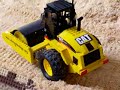 vibrando, vibrando il rullo compatta la terra spianata dal bulldozer!