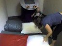 Derek jumping on pillows