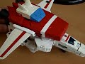 here's my custom skyfire. it took 6 months of work. i bought a classics jetfire figure especially for this kitbash. initially i wanted to create a cartoon skyfire. i ended up making a dreamwave comics skyfire. the only difference between the dw and cartoon version is the head. the kitbash was done by measuring, cutting with a dremel, drilling, sanding, painting, sculpting and a lot of patience. the paint apps on the figure were done in multiple sanded layers. i finished all paint apps with multiple layers of clear coat. the sculpting was done using putty.

used materials:
- electric drill
- electric cutting tool
- hammer
- hobby knives
- screwdrivers
- paintbrushes
- enamel modeling paint
- clear coat
- milliput hobby clay
- protective gear

the head:
i gave it a paint job and filled the gaps between his antennas and the top of his head with putty so that they become one solid piece.

chest:
the cockpit on his chest was given a repaint and an autobot sign. i shortened his nose cone with a dremel and sculpted the ends. the removable chest pieces with outlets on the left and right side of his cockpit had to be custom-made. i used putty for this purpose. since these chest pieces needed to be accurate and have the lines/details of skyfire it was done in several stages of sculpting, drying, adding new layers of putty and more sculpting. then ofcourse, the paint job and clear finish.

waist:
i created the typical skyfire red hip parts using putty and gave it a red/white paint app.

arms:
triangles were added to his lower arms. it makes no sense, but skyfire has those things.

hands:
i painted his hands white.

legs:
i repainted them and gave them the red parts which i made with putty.

feet:
i removed the pointy ends of his feet and sculpted blocky skyfire feet on top of it, after some serious sanding.

back:
i removed the wings from his body by cutting his upper backplate at the ends. i refilled it with putty, sanded it and gave it some paint.

backpack:
i had to reconstruct skyfire's backpack. i took classics jetfire's rocket boosters, cut certain parts, reversed the upper booster parts and drilled holes. i made custom screws that hold the parts together. the gaps were filled with putty and sanded. i used the plastic strips included in the box, cut one of them and used it to connect both parts of the sliding mechanisms on the back with the center block. 2 small wings were sculpted on the center block. i provided the lower part of the center block with 4 holes and mounted it with custom made screws to the boosters so that i can still mount the backpack to skyfire.

i mounted his wings onto the backpack in such a way that i can transform them. i bought some articulation parts to hold the wings upward when skyfire is in robot mode. these parts are integrated into the backpack using putty.