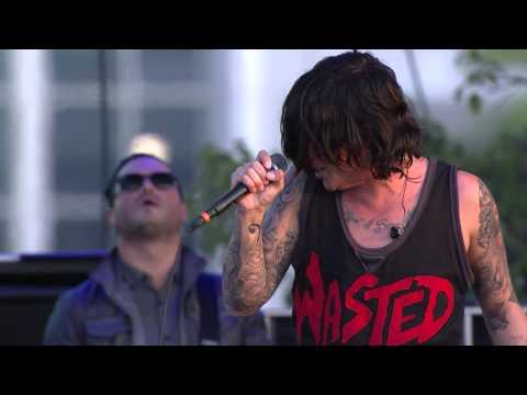 perform - For the second song of their APMAs set, Sleeping With Sirens bring out guest Machine Gun Kelly to perform