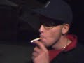 man smokes a whole cigarette in one drag