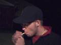 man smokes a whole cigarette in one drag