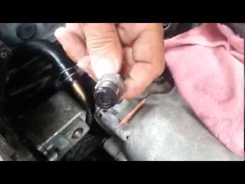 How to replace Nissan Altima 2.4L PCV valve location.