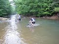 Jason Diurba rides through 4 foot of water