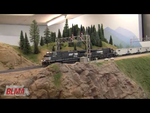 ho scale - Visit Tim Dickinson's HO Scale model train layout for an unusual sight - Norfolk Southern locomotives and TopGon coal cars traversing the line between Spokan...