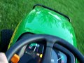 John Deere X585 In Action cutting Grass part 1