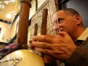 David Gilden playing the kora at a party in Arlington Texas. Dave is using the Eventide's TimeFactor for the reverse echo effect in this clip. Hear more of Dave's new kora music @ SoundCloud, search for 'koraDave', enjoy! Learn more about the kora @ www.coraconnection.com