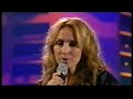 tim freedman, of the whitlams, performing 'keep the light on' with lisa mccune on the good friday appeal telethon in 2006.